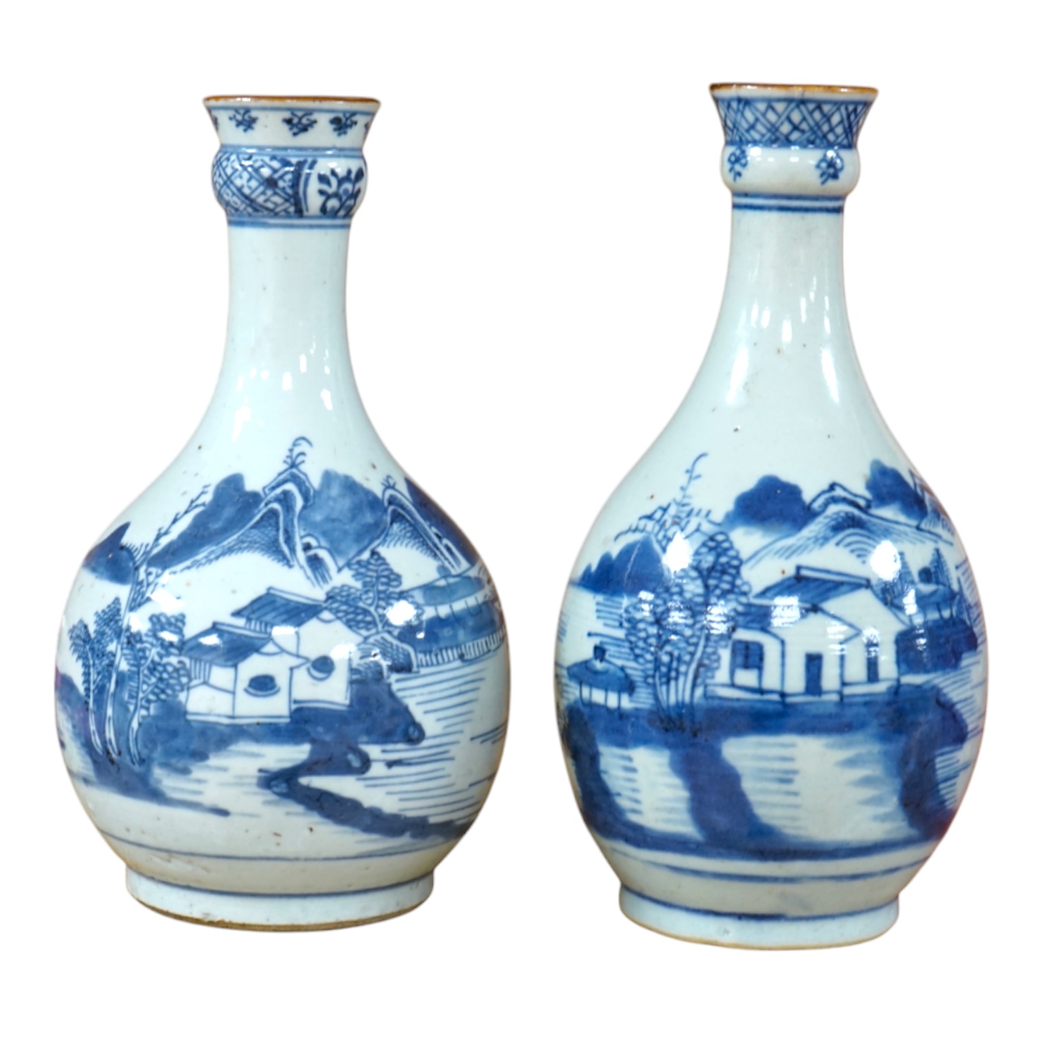 Two Chinese blue and white guglet bottles, 18th century, tallest 24cm high. Condition - good